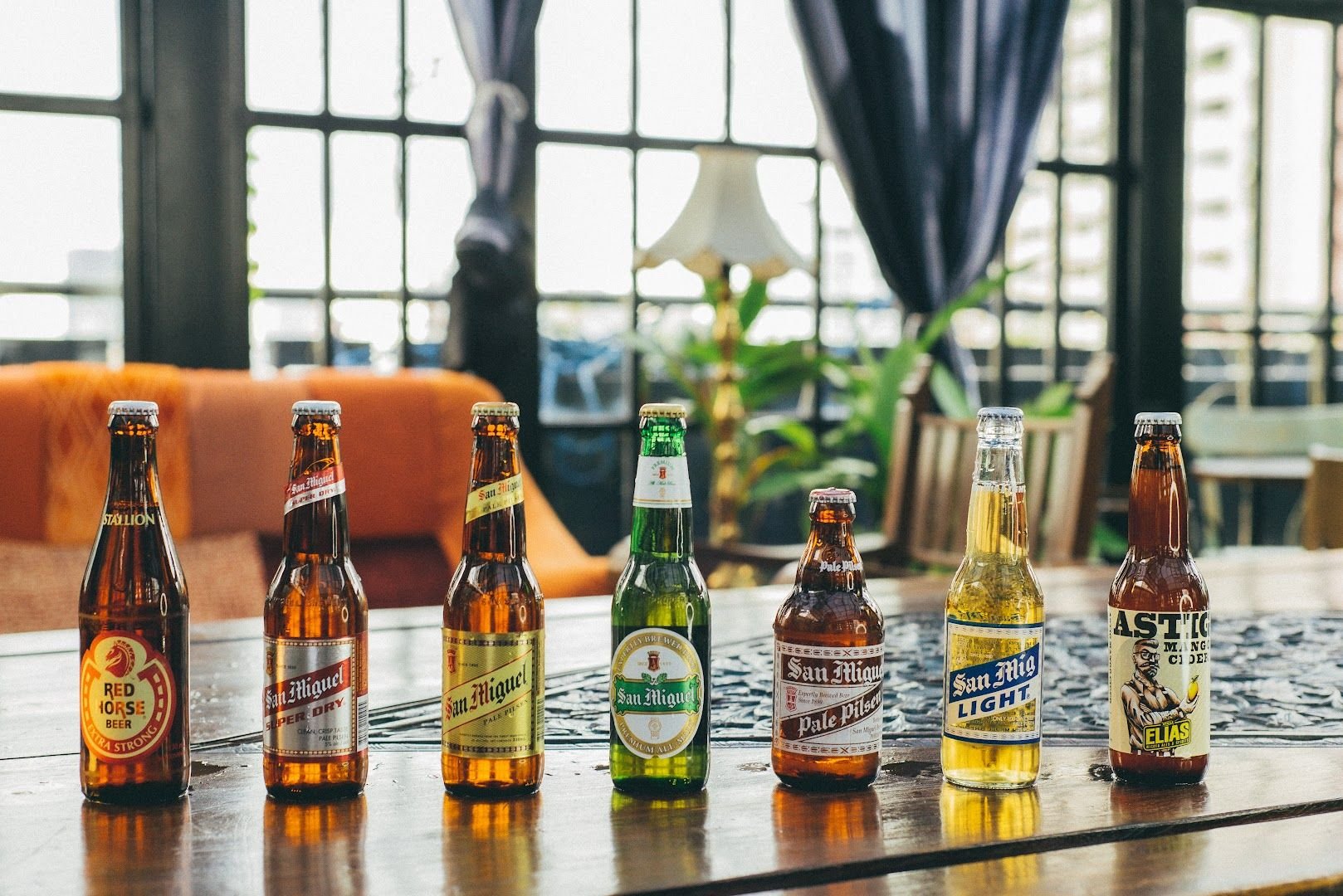 Beer selection at Seltsam with San Miguel and craft beers on vintage table